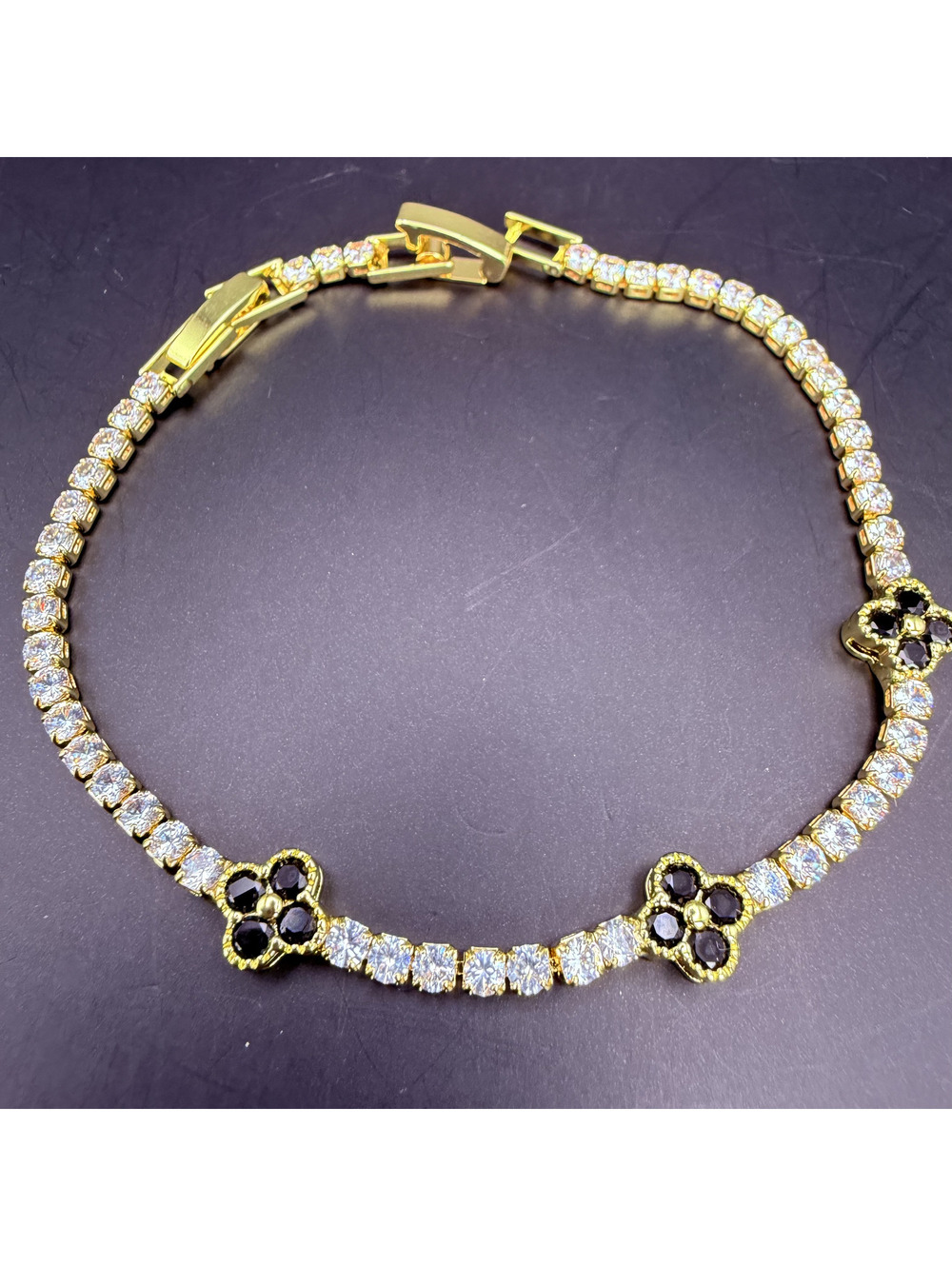 candy+clover black clover and clear gold tone station tennis bracelet